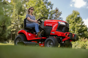 Person riding on CRAFTSMAN T2400K Riding Mower 